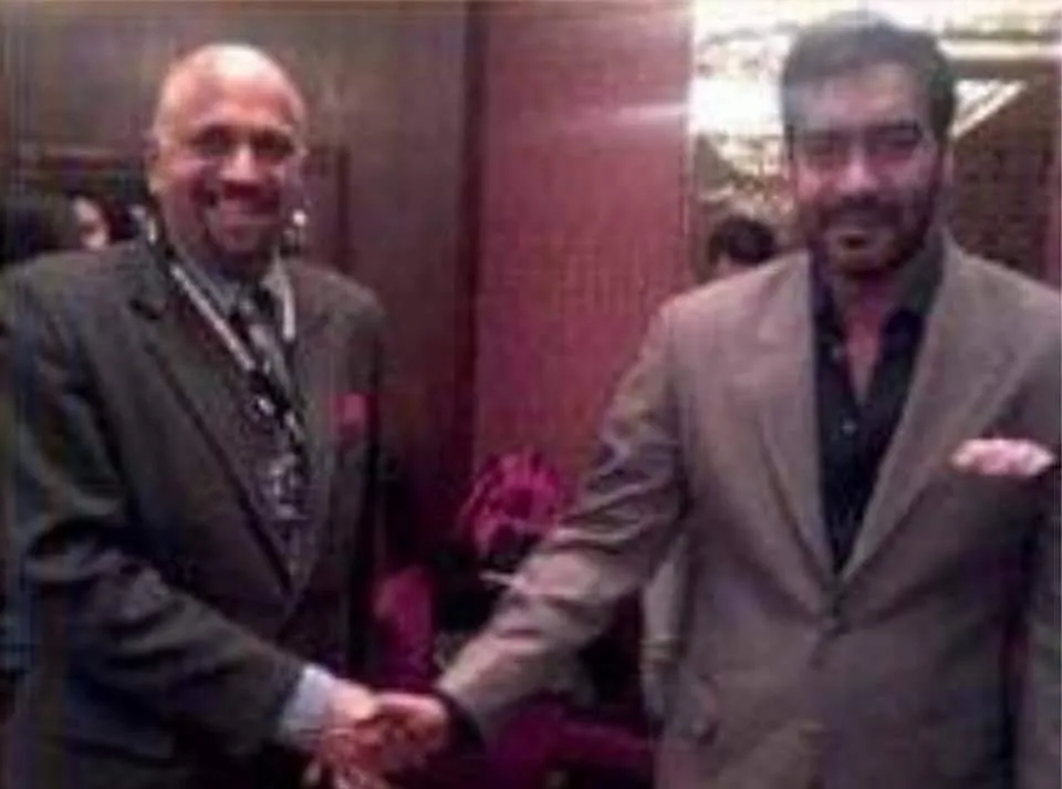 Surinder Rana with Ajay Devgan