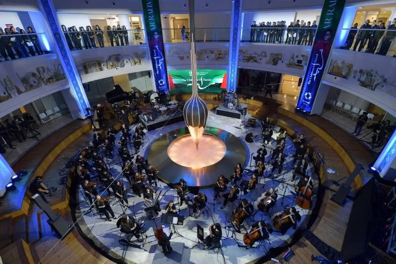 Firdaus Orchestra performing at Abu Dhabi's Burjeel Medical City on UAE National Day 3.jpg