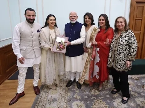 क्या आप गाने सुनते हैं? आलिया के सवाल पर PM मोदी ने क्या कहा? | kapoor  family meets pm narendra modi karisma kareena took autograph ranbir alia  poses for camera