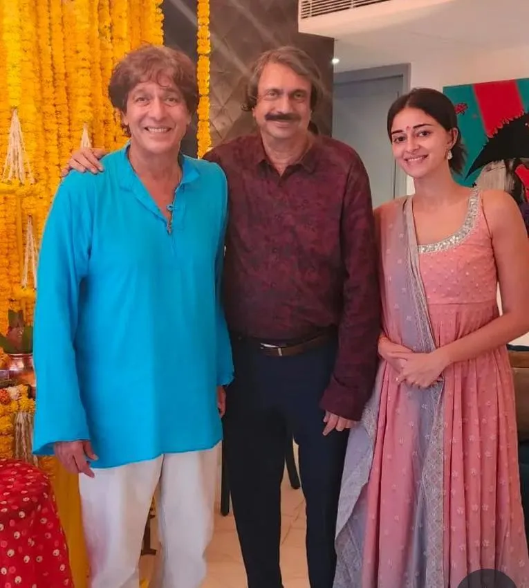 Ananya Panday with her father Chunky Pandey and journalist Chaitanya Padukone (centre)