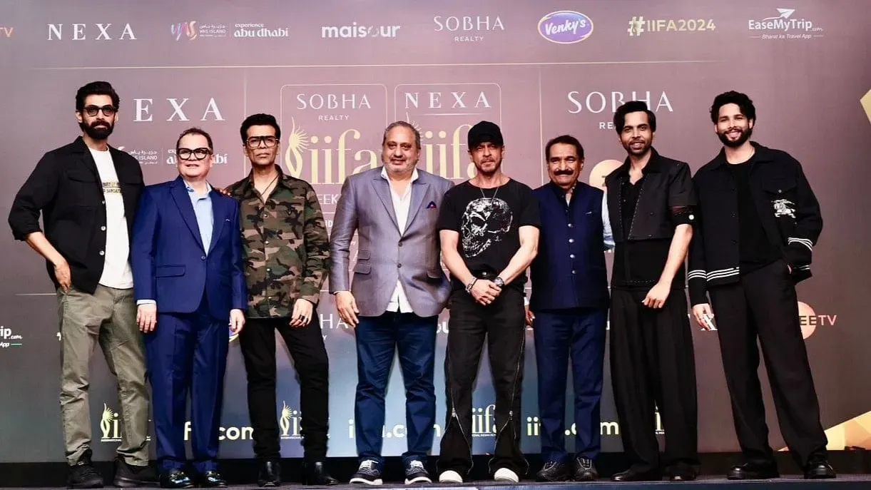 Celebrities pose with the organizers during a press conference for the 24th edition of the International Indian Film Academy (IIFA) Weekend and Awards, in Mumbai.