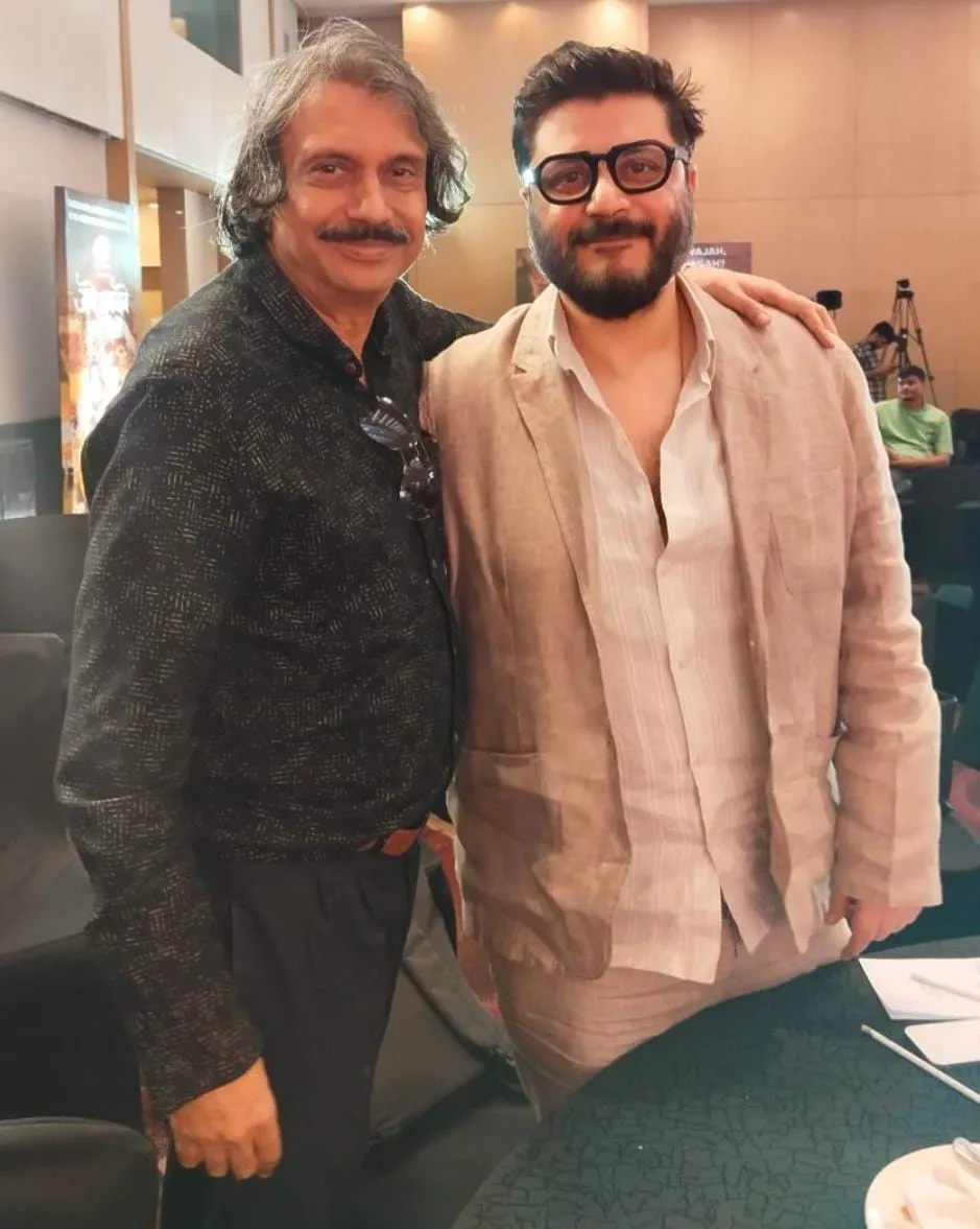 Producer Goldie Behl (right) with journalist Chaitanya Padukone