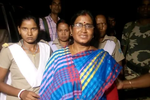 Hazaribagh, Jharkhand 25 August 2015 :: Barkagaon MLA Nirmala Devi escorted by police officials after her arresting, at Hazaribagh court of Jharkhand on Tuesday. Photo-Ratan Lal