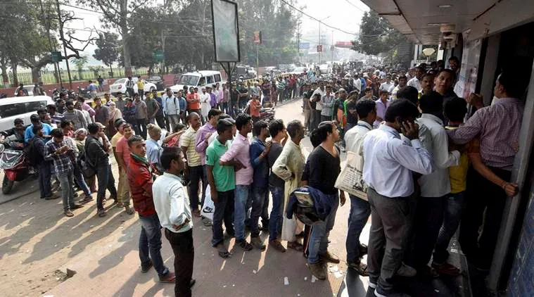 Patna: People queue up at an ATM in Patna on Saturday. PTI photo(PTI11_12_2016_000101B)
