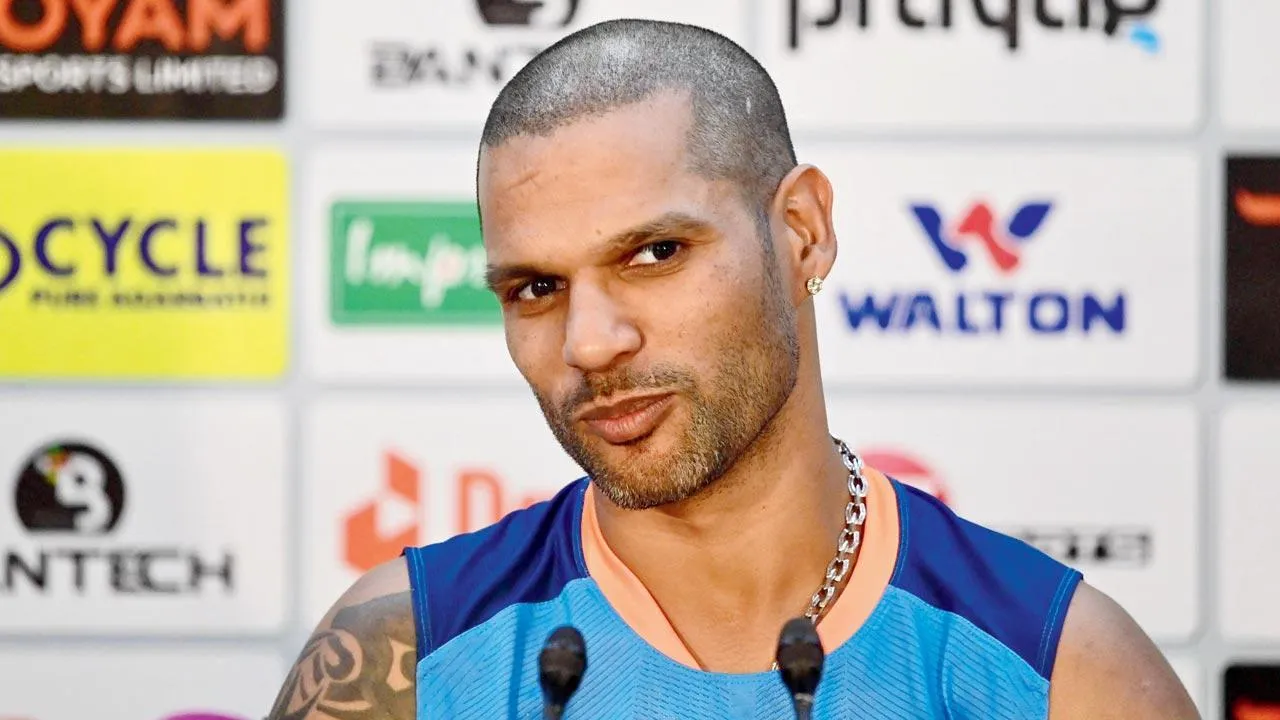Shikhar Dhawan focusing on his sweeping skills