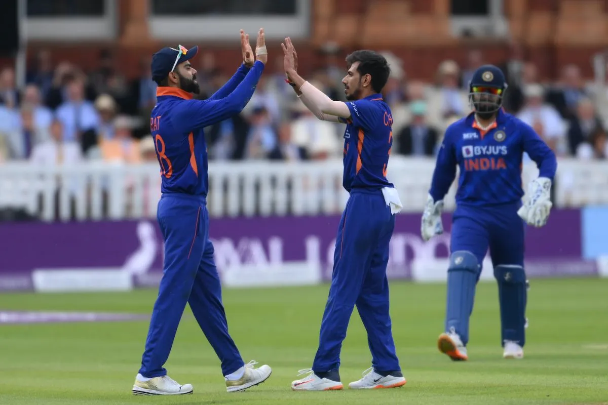 Virat Kohli high-fives Yuzvendra Chahal, who picked up key wickets of Joe Root and Jonny Bairstow, England vs India, 2nd ODI, Lord's, London, July 14, 2022 