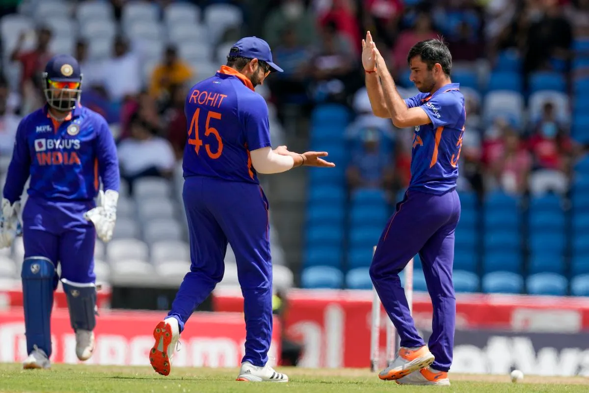 Ravi Bishnoi is met by a delighted Rohit Sharma after he dismissed Rovman Powell, West Indies vs India, 1st T20I, Tarouba, July 29, 2022 