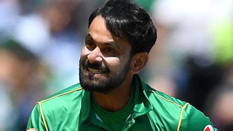 Image result for mohammad hafeez bowling