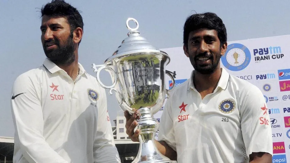 Cheteshwar Pujara and Wriddhiman Saha with Irani Cup