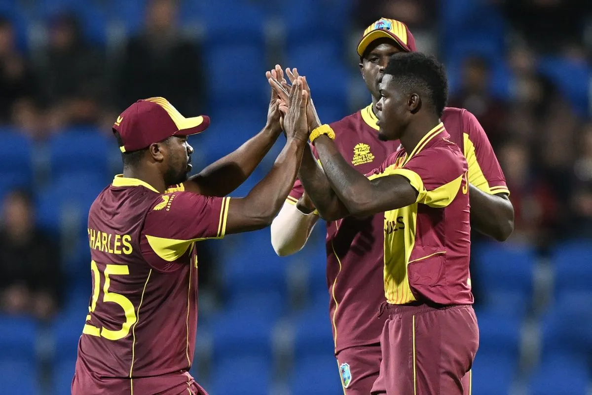 Alzarri Joseph celebrates with team-mates after getting Regis Chakabva, West Indies vs Zimbabwe, ICC Men's T20 World Cup, Hobart, October 19, 2022 