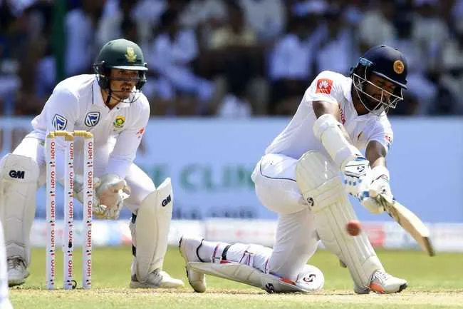 Dimuth Karunaratne stitched a half-century stand with Angelo Mathews but fell short of his century