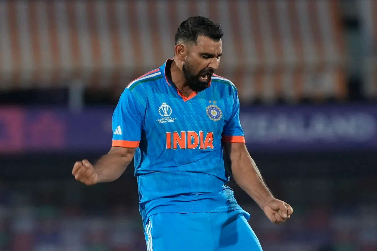 Mohammed Shami is pumped after knocking Mitchell Santner over with a yorker, India vs New Zealand, Men's ODI World Cup, Dharamsala, October 22, 2023