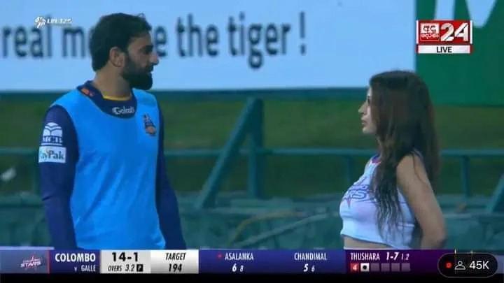 Iftikhar Ahmed with cheer girl