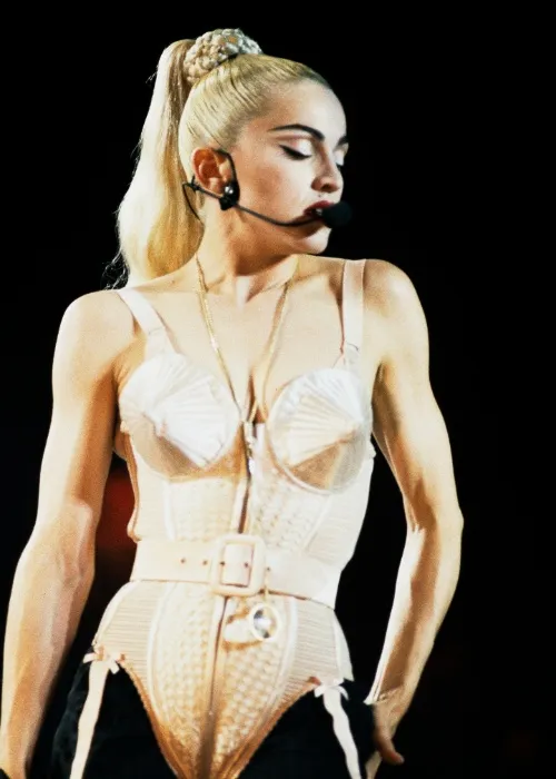 Madonna in her iconic braid wrapped ponytail Madonna in her iconic braid wrapped ponytail 