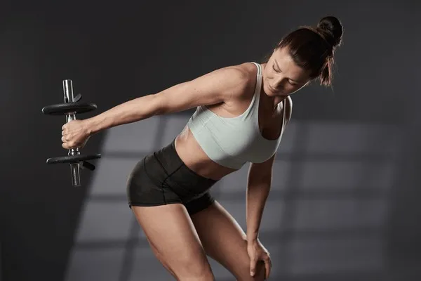 Dumbbell Standing Triceps Extension Royalty-Free Images, Stock Photos &  Pictures | Shutterstock