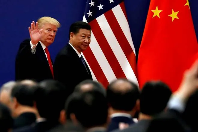 US President Donald Trump threatens to terminate trade deal if China does not honour it citing coronavirus crisis