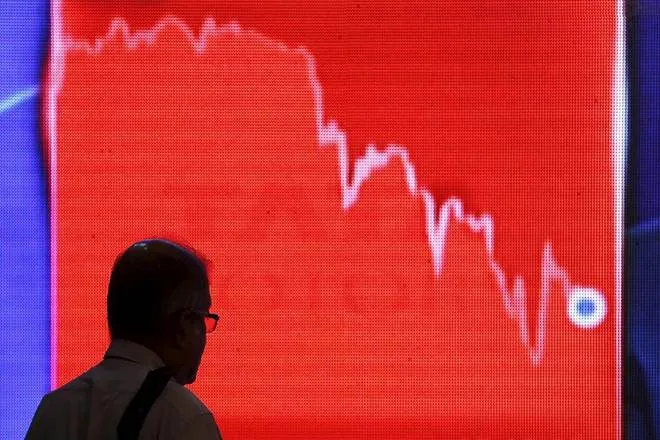 lower circuit in sensex and nifty, circuit in stock market, volatility in stock market, big fall in sensex and nifty, COVID-19, coronavirus impact on stock market, Crude prices fall, rupee on record low