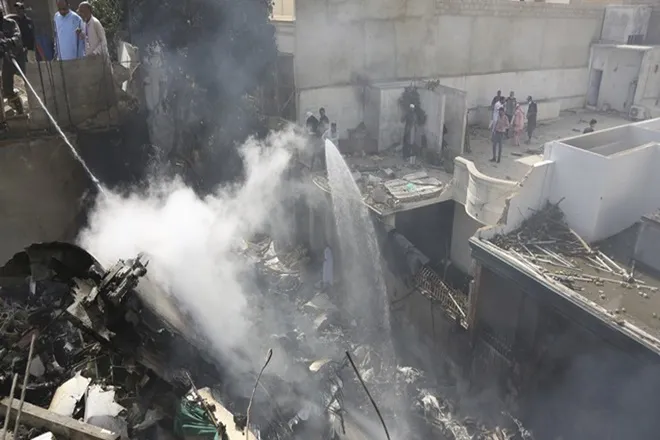 flight crashed before landing in karachi in pakistan flight crashed in residential area