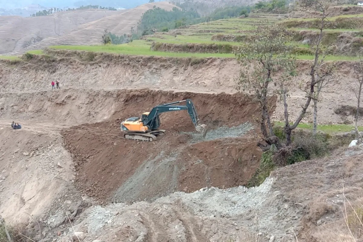 Excavator dumping muck in Uttarakhand, increasing landslide risks amidst rising incidents in 2023