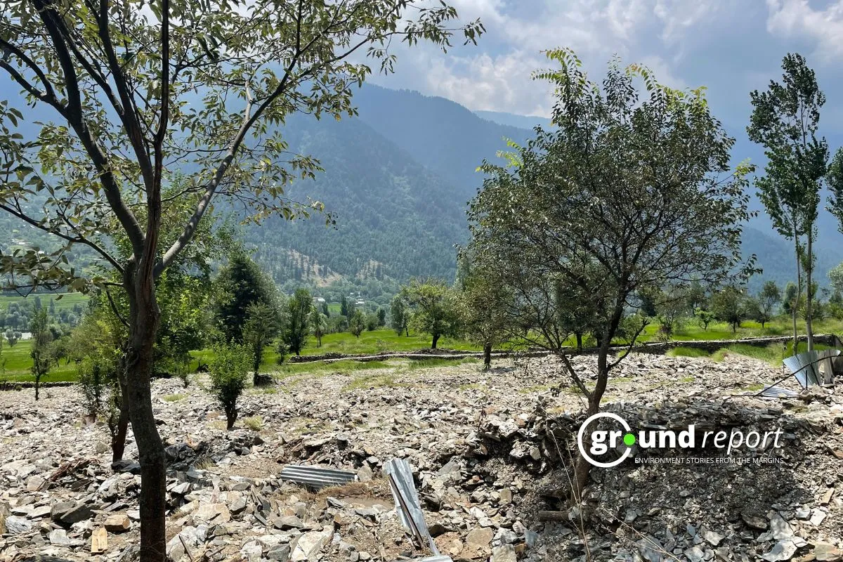 The aftermath of the cloudburst in Kawacherwan, with agricultural fields covered in debris, severely impacting the local farmers.