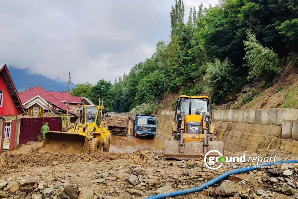 Heavy machinery is deployed to clear debris and restore access in Padabal Village after the devastating landslide