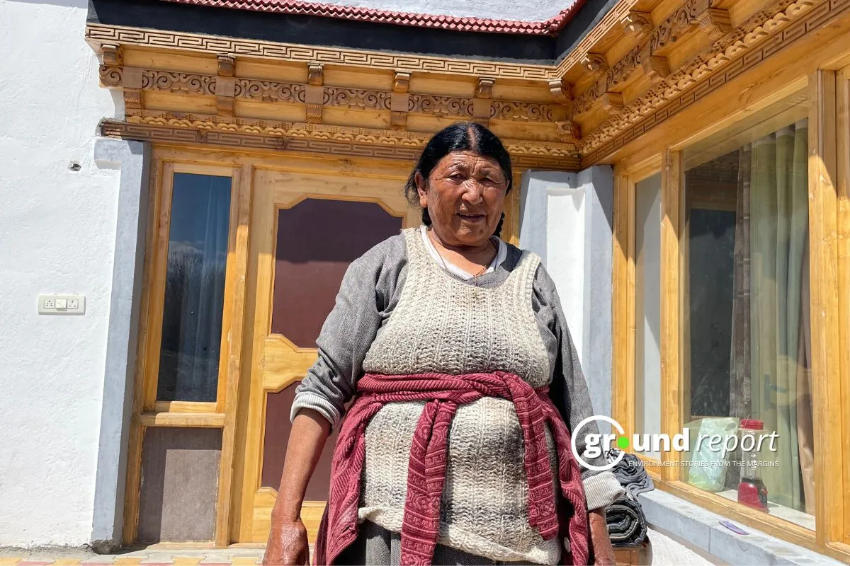 Tsewang Kunzes sitting outside her house in Leh. Photo Credit: Wahid Bhat/Ground Report