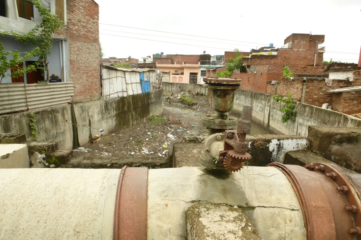 A view of the nala with the pipes carrying treated wastewater