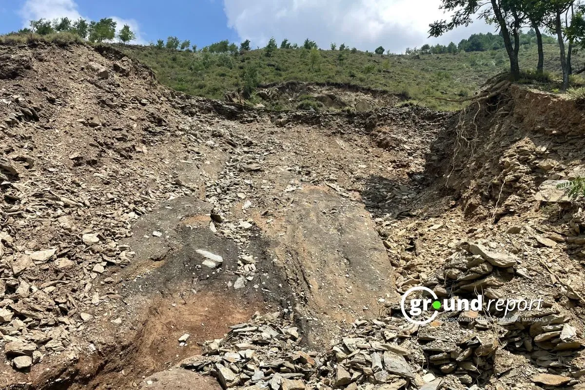 A massive landslide in Kawacherwan village, with rocks and mud covering what was once fertile agricultural land owned by local farmers.