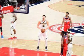 Nikola Jokic of the Denver Nuggets shooting a free throw against the Washington Wizards