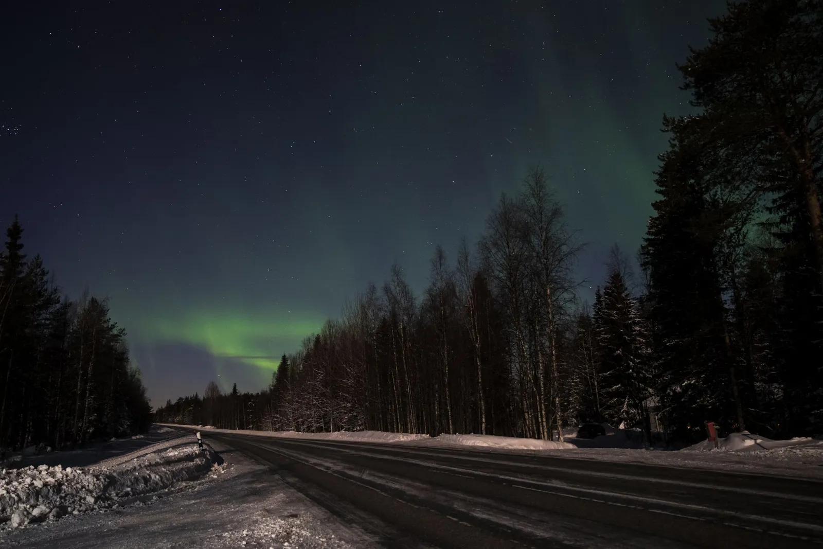 Credit Unsplash  Northern Lights in Rovaniemi by Marc Wieland]