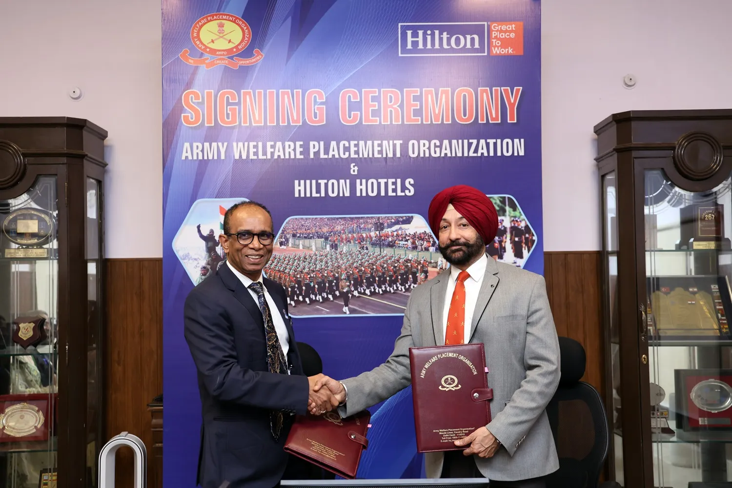 L R Sabu Raghavan vp human resources South Asia Hilton and Col Kanwaljit Singh Uppal AWPO at Hilton X AWPO MOU Signing