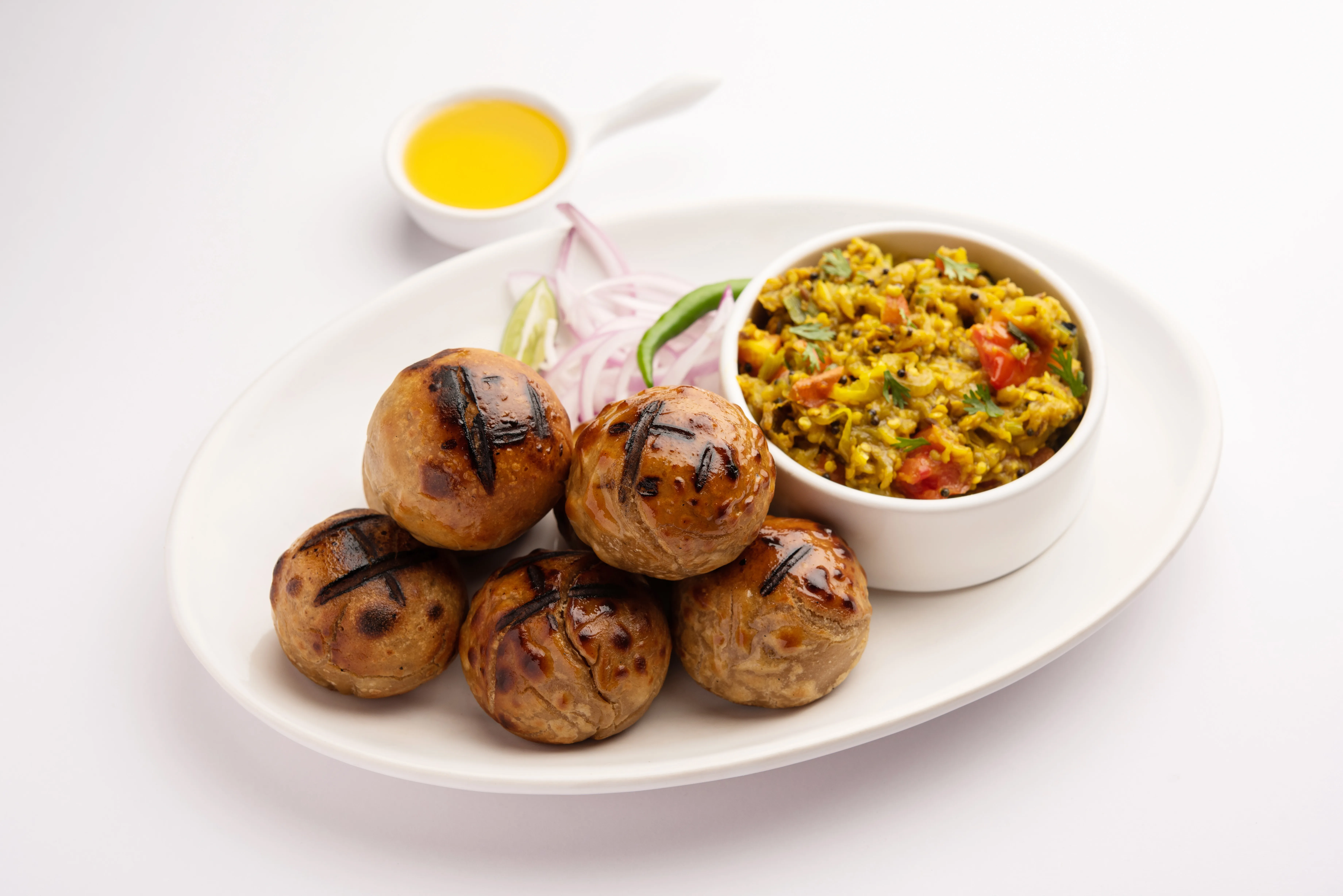 litti chokha served plate with desi ghee