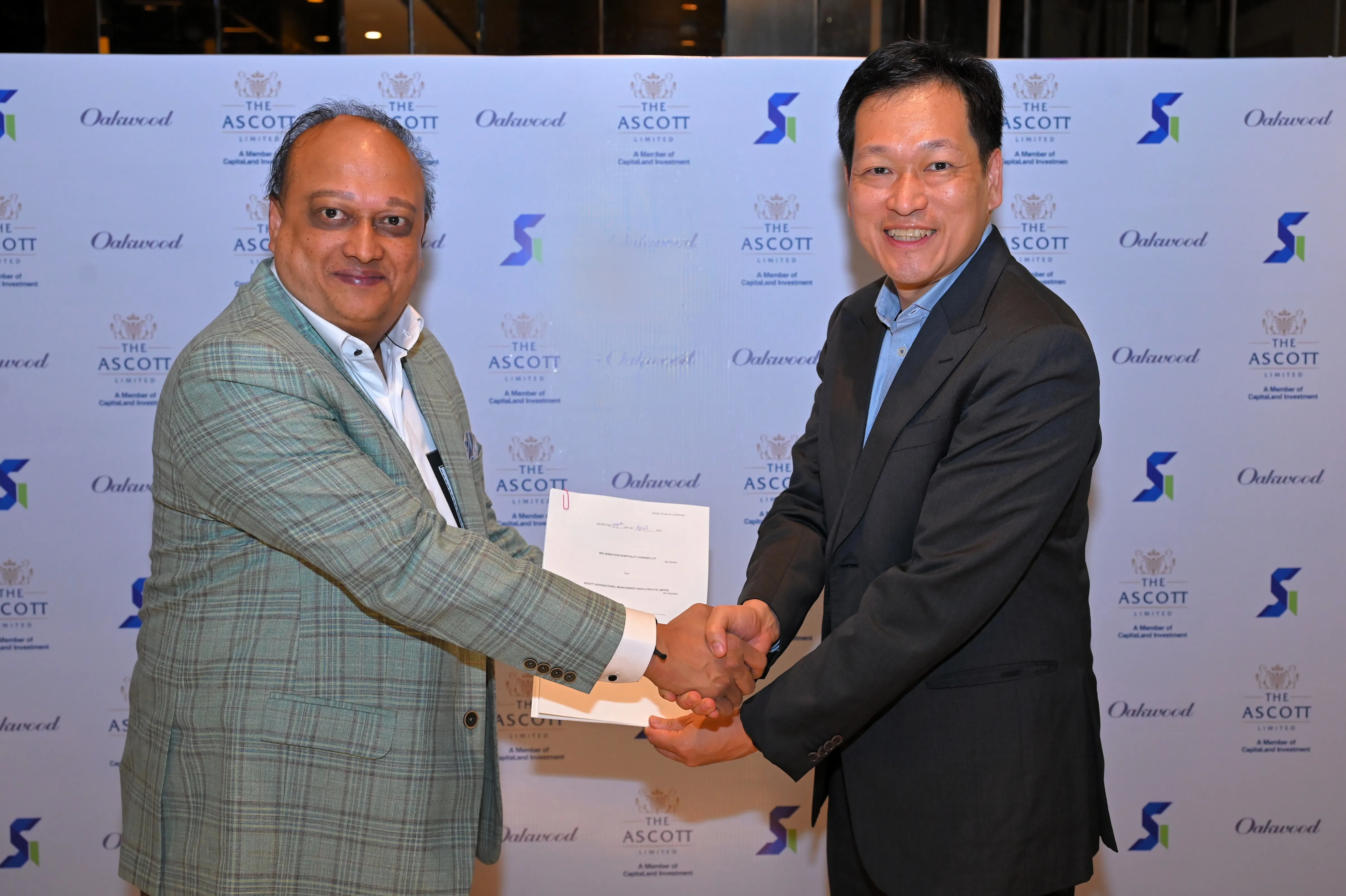 Mr Kevin Goh CEO of The Ascott Limited right with Mr Bhavishya Gupta Chairman of Sensation Infracon Pvt Ltd