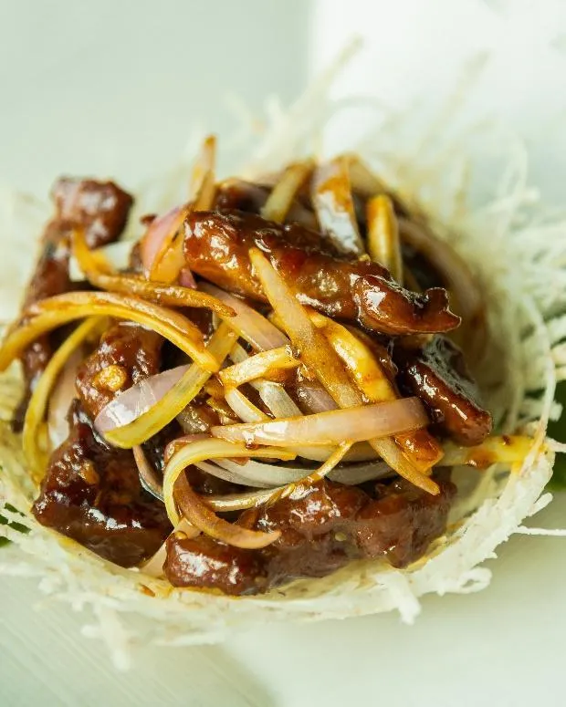 C:\Users\rakhi_merakicreative\Documents\Yauatcha\Yauatcha Seasonal Menu\Szechuan Stir-fry lamb in garlic herb sauce.jpg