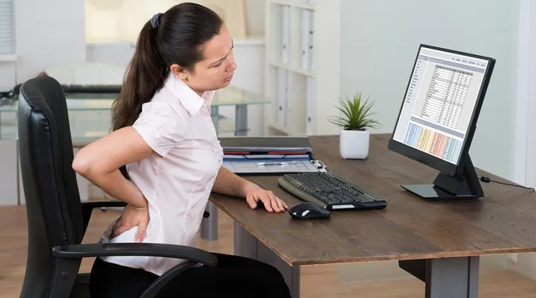Businesswoman Suffering From Backache