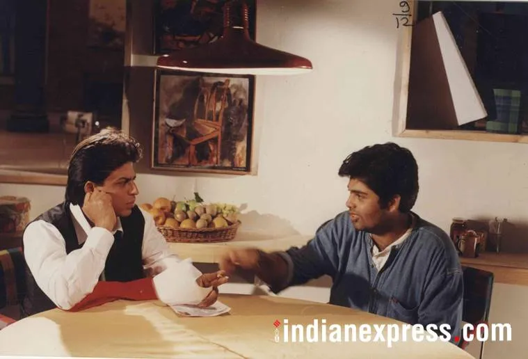 Shahrukh Khan and Director Karan Johar on the set of film KUCH KUCH HOTA HAI. *** Local Caption *** Shahrukh Khan and Director Karan Johar on the set of film KUCH KUCH HOTA HAI. 
