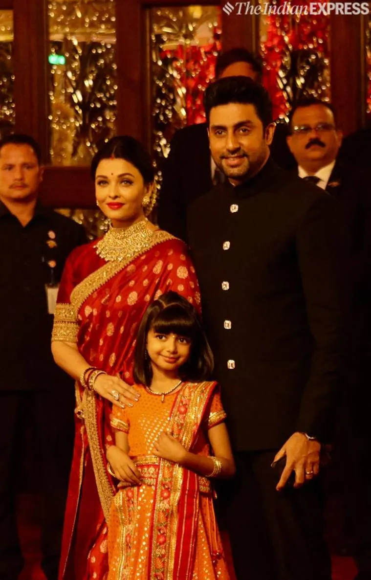 Aishwarya Rai Bachchan and Abhishek Bachchan arrive at Isha Ambani’s wedding. (Express photo by Nirmal Harindran)