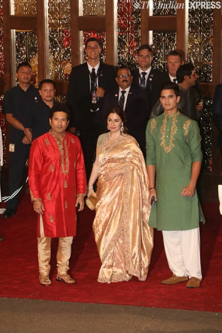 Sachin Tendulkar with wife Anjali and son Arjun at Isha Ambani’s wedding. (Photo: Varinder Chawla)