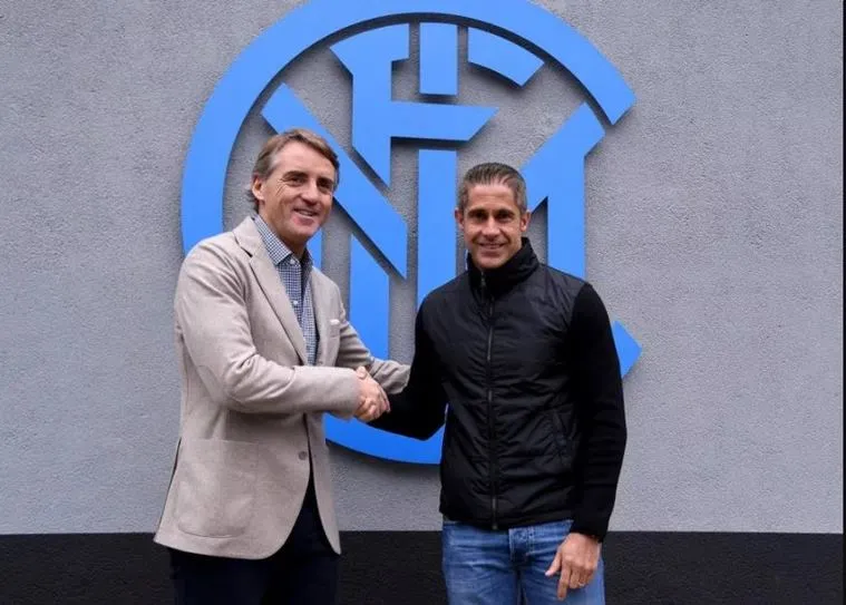 Sylvinho with Roberto Mancini