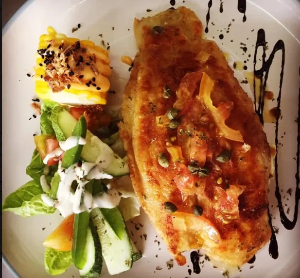 poached bekti in lemon butter sauce