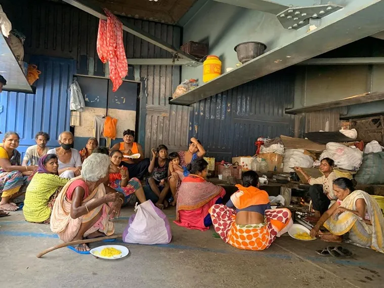 Actress Chaiti Ghoshal and son Amartya feeding homeless Amphan Affected people in Kolkata