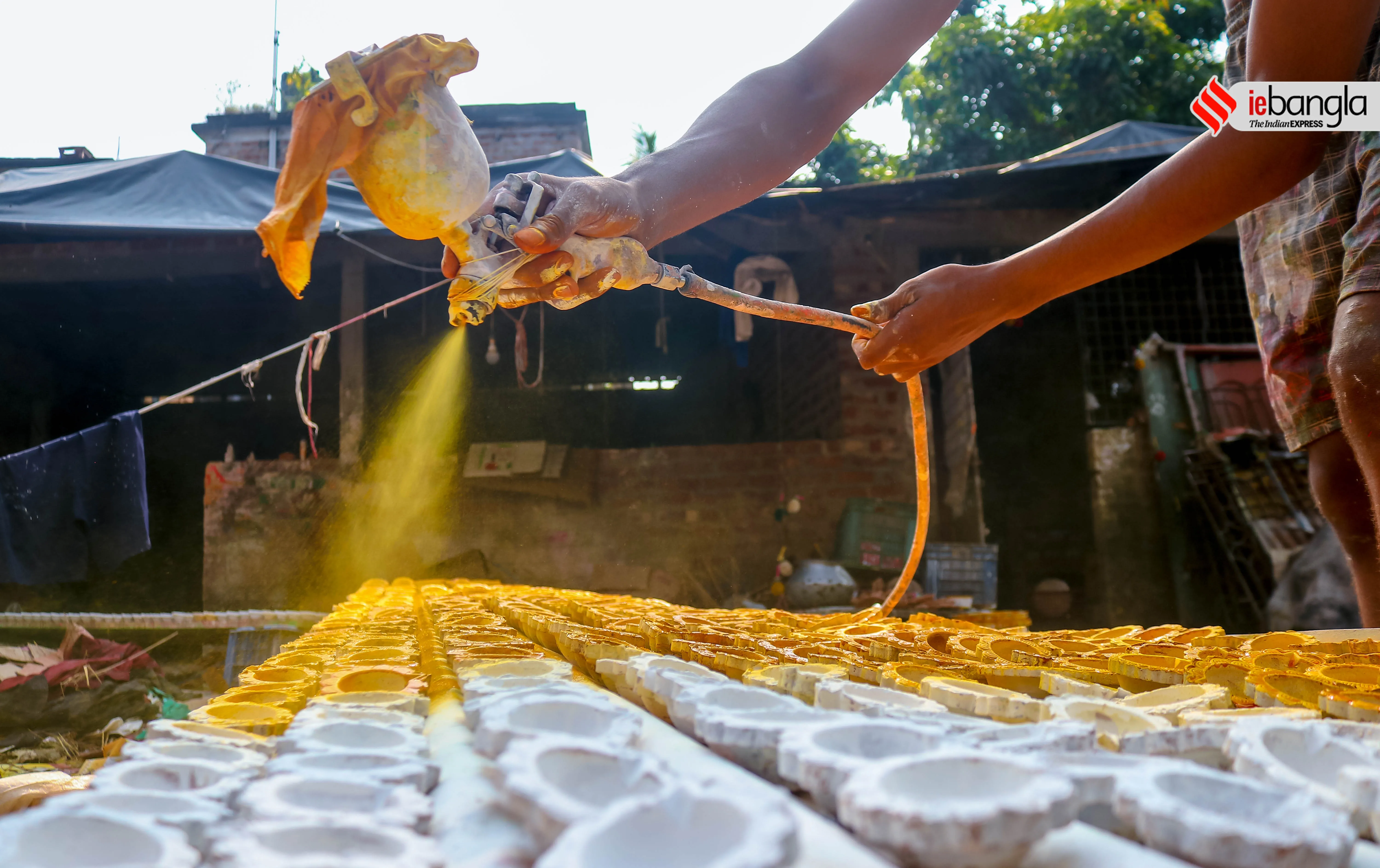 earthen lamps, মাটির প্রদীপ, diya, দীপাবলি, Diwali, আলোকসজ্জা, festival, প্রদীপ, potters, Diwali 2021, কালীপূজা, Hindu festival, মৃৎশিল্পী, মাটির প্রদীপ, diya, দীপাবলি, diwali, আলোকসজ্জা, festival, প্রদীপ, potters, diwali 2021, কালীপূজা, hindu festival, মৃৎশিল্পী, প্রদীপের নীচেই অন্ধকার, করোনা, corona, কোভিড-১৯, Covid-19, করোনা মহামারী, Corona Pandemic, ২০২১, প্রদীপ গ্রাম, earthen lamps village, চালতাবেড়িয়া, Chaltaberia, বারাসাত, barasat, বারাসাতের কালীপূজা, Barasat Kalipuja, ভারত-বাংলাদেশ, India-Bangladesh, শিল্পী, artist, কুটির শিল্প, Cottage industry, কুটির শিল্পী, Cottage artist, পশ্চিমবঙ্গের কুটির শিল্প, Cottage industry in West Bengal, ইন্ডিয়া রেকর্ড, India Record, West Bengal news, indian express, কলেজ স্ট্রিট, college street, করোনা, corona, corona news, Bangla Khabar, বাংলার খবর, Bangla News Live, বাংলার ব্রেকিং নিউজ, Breaking Bangla News,Bangali news, বাংলায় সর্বশেষ খবর, লেটেস্ট খবর, News in Bengali, Bengali News Today, বাংলা নিউজ, Bengali News, করোনা মহামারী, corona pandemic, Bangla Khabor, কোভিড-১৯, covid, News in Bangla, করোনা ২০২১, corona 2021, 24 Ghanta Bangla News, Bangla News, covid-19
