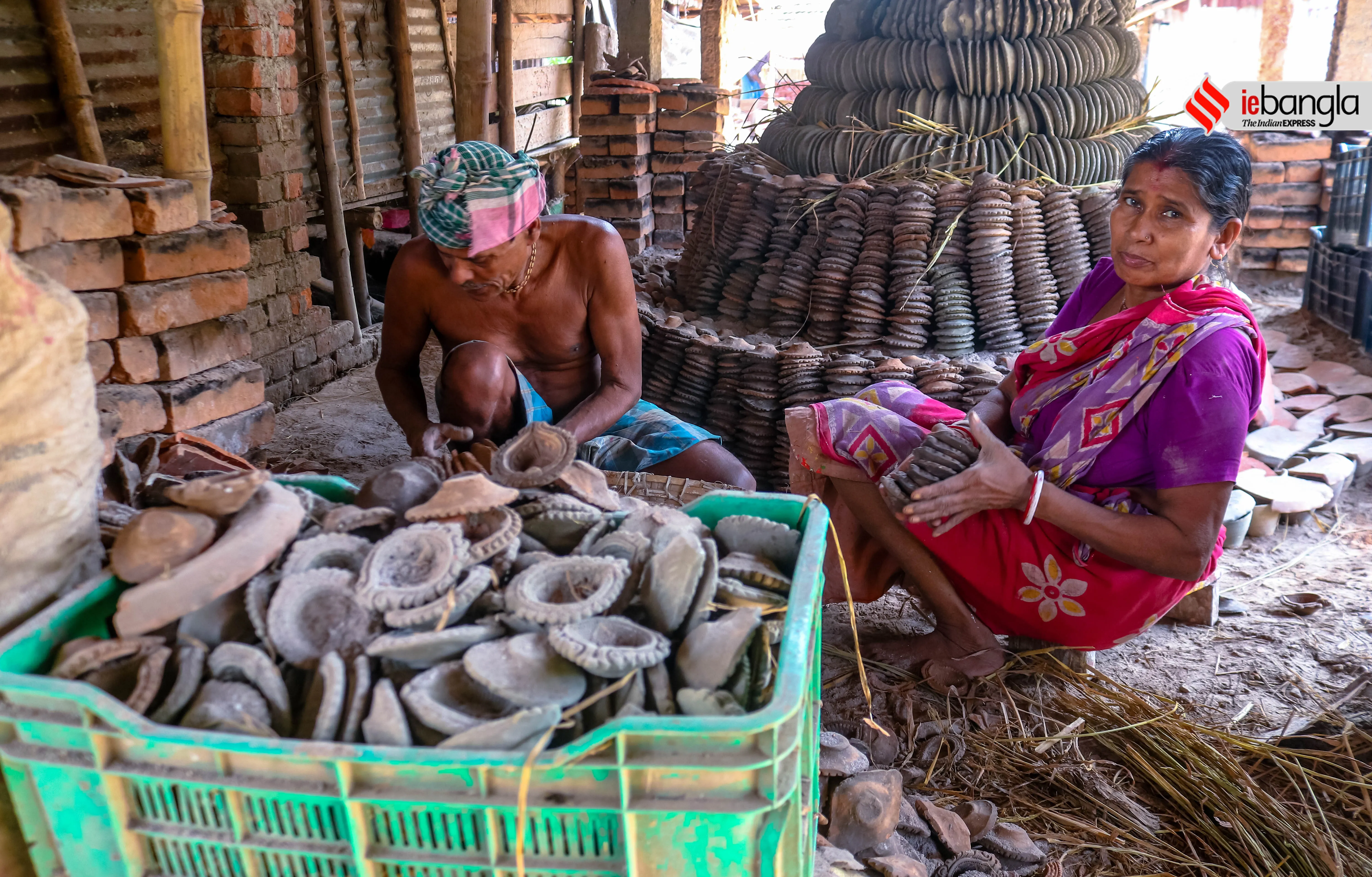 earthen lamps, মাটির প্রদীপ, diya, দীপাবলি, Diwali, আলোকসজ্জা, festival, প্রদীপ, potters, Diwali 2021, কালীপূজা, Hindu festival, মৃৎশিল্পী, মাটির প্রদীপ, diya, দীপাবলি, diwali, আলোকসজ্জা, festival, প্রদীপ, potters, diwali 2021, কালীপূজা, hindu festival, মৃৎশিল্পী, প্রদীপের নীচেই অন্ধকার, করোনা, corona, কোভিড-১৯, Covid-19, করোনা মহামারী, Corona Pandemic, ২০২১, প্রদীপ গ্রাম, earthen lamps village, চালতাবেড়িয়া, Chaltaberia, বারাসাত, barasat, বারাসাতের কালীপূজা, Barasat Kalipuja, ভারত-বাংলাদেশ, India-Bangladesh, শিল্পী, artist, কুটির শিল্প, Cottage industry, কুটির শিল্পী, Cottage artist, পশ্চিমবঙ্গের কুটির শিল্প, Cottage industry in West Bengal, ইন্ডিয়া রেকর্ড, India Record, West Bengal news, indian express, কলেজ স্ট্রিট, college street, করোনা, corona, corona news, Bangla Khabar, বাংলার খবর, Bangla News Live, বাংলার ব্রেকিং নিউজ, Breaking Bangla News,Bangali news, বাংলায় সর্বশেষ খবর, লেটেস্ট খবর, News in Bengali, Bengali News Today, বাংলা নিউজ, Bengali News, করোনা মহামারী, corona pandemic, Bangla Khabor, কোভিড-১৯, covid, News in Bangla, করোনা ২০২১, corona 2021, 24 Ghanta Bangla News, Bangla News, covid-19