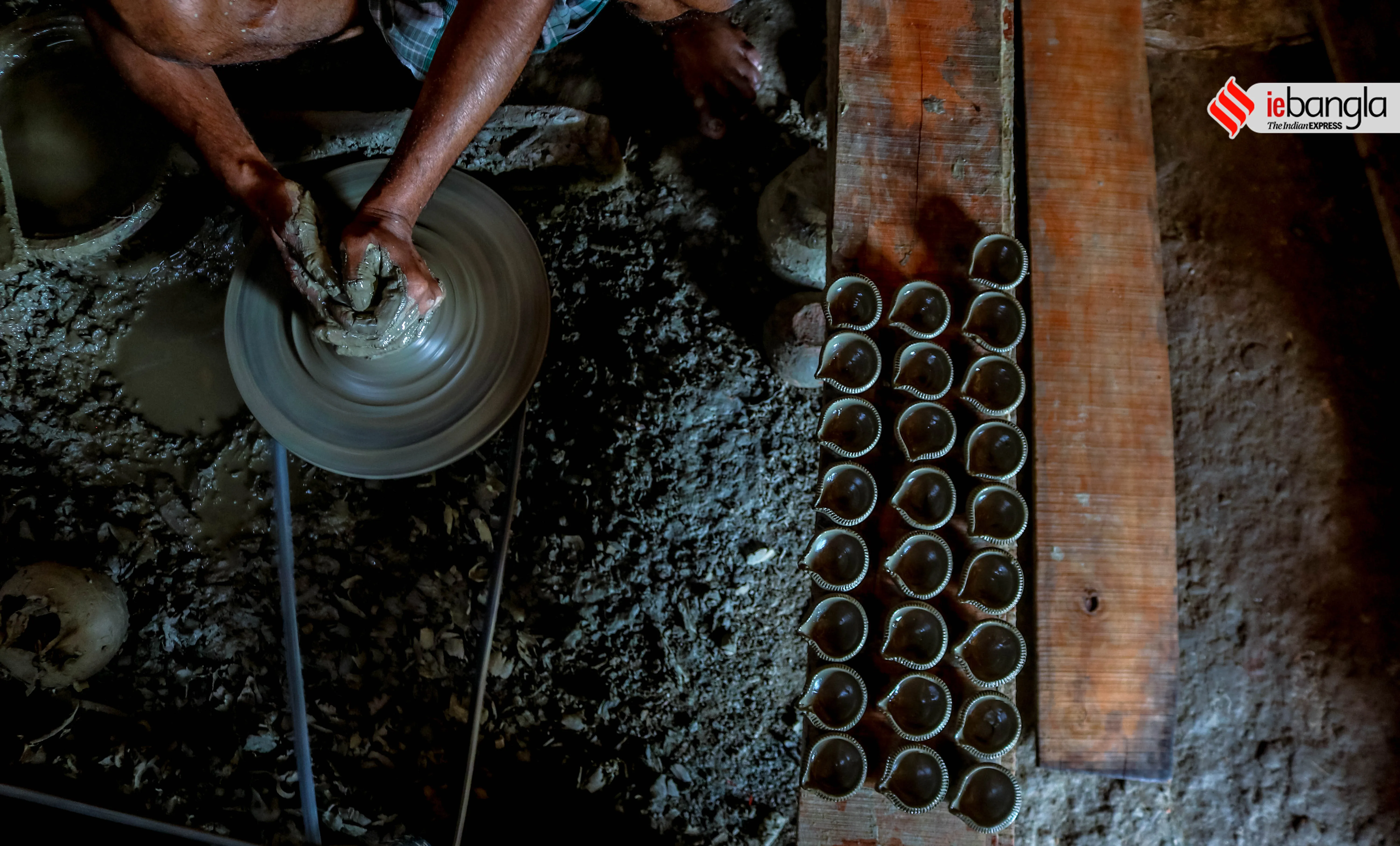 earthen lamps, মাটির প্রদীপ, diya, দীপাবলি, Diwali, আলোকসজ্জা, festival, প্রদীপ, potters, Diwali 2021, কালীপূজা, Hindu festival, মৃৎশিল্পী, মাটির প্রদীপ, diya, দীপাবলি, diwali, আলোকসজ্জা, festival, প্রদীপ, potters, diwali 2021, কালীপূজা, hindu festival, মৃৎশিল্পী, প্রদীপের নীচেই অন্ধকার, করোনা, corona, কোভিড-১৯, Covid-19, করোনা মহামারী, Corona Pandemic, ২০২১, প্রদীপ গ্রাম, earthen lamps village, চালতাবেড়িয়া, Chaltaberia, বারাসাত, barasat, বারাসাতের কালীপূজা, Barasat Kalipuja, ভারত-বাংলাদেশ, India-Bangladesh, শিল্পী, artist, কুটির শিল্প, Cottage industry, কুটির শিল্পী, Cottage artist, পশ্চিমবঙ্গের কুটির শিল্প, Cottage industry in West Bengal, ইন্ডিয়া রেকর্ড, India Record, West Bengal news, indian express, কলেজ স্ট্রিট, college street, করোনা, corona, corona news, Bangla Khabar, বাংলার খবর, Bangla News Live, বাংলার ব্রেকিং নিউজ, Breaking Bangla News,Bangali news, বাংলায় সর্বশেষ খবর, লেটেস্ট খবর, News in Bengali, Bengali News Today, বাংলা নিউজ, Bengali News, করোনা মহামারী, corona pandemic, Bangla Khabor, কোভিড-১৯, covid, News in Bangla, করোনা ২০২১, corona 2021, 24 Ghanta Bangla News, Bangla News, covid-19