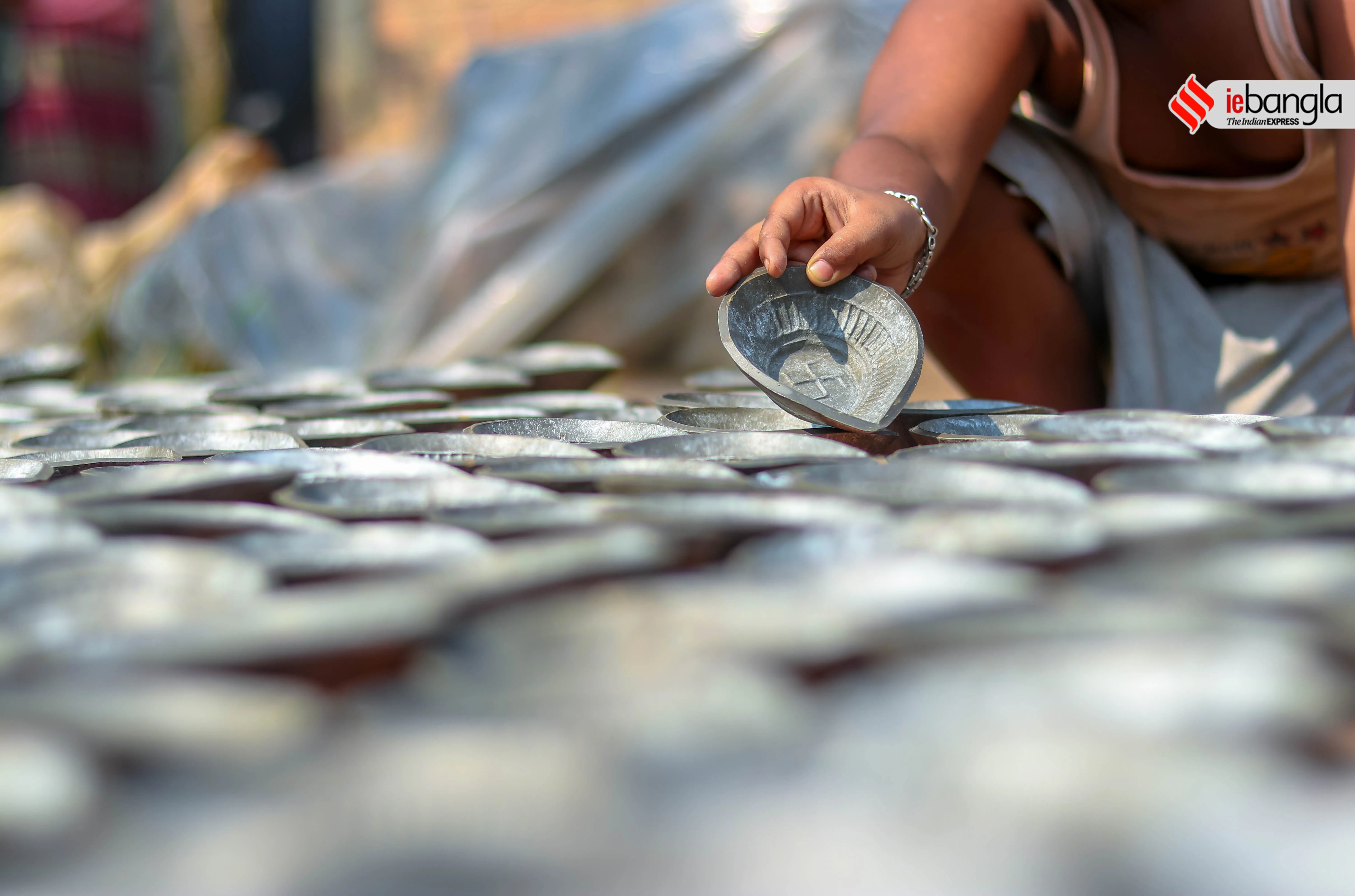 earthen lamps, মাটির প্রদীপ, diya, দীপাবলি, Diwali, আলোকসজ্জা, festival, প্রদীপ, potters, Diwali 2021, কালীপূজা, Hindu festival, মৃৎশিল্পী, মাটির প্রদীপ, diya, দীপাবলি, diwali, আলোকসজ্জা, festival, প্রদীপ, potters, diwali 2021, কালীপূজা, hindu festival, মৃৎশিল্পী, প্রদীপের নীচেই অন্ধকার, করোনা, corona, কোভিড-১৯, Covid-19, করোনা মহামারী, Corona Pandemic, ২০২১, প্রদীপ গ্রাম, earthen lamps village, চালতাবেড়িয়া, Chaltaberia, বারাসাত, barasat, বারাসাতের কালীপূজা, Barasat Kalipuja, ভারত-বাংলাদেশ, India-Bangladesh, শিল্পী, artist, কুটির শিল্প, Cottage industry, কুটির শিল্পী, Cottage artist, পশ্চিমবঙ্গের কুটির শিল্প, Cottage industry in West Bengal, ইন্ডিয়া রেকর্ড, India Record, West Bengal news, indian express, কলেজ স্ট্রিট, college street, করোনা, corona, corona news, Bangla Khabar, বাংলার খবর, Bangla News Live, বাংলার ব্রেকিং নিউজ, Breaking Bangla News,Bangali news, বাংলায় সর্বশেষ খবর, লেটেস্ট খবর, News in Bengali, Bengali News Today, বাংলা নিউজ, Bengali News, করোনা মহামারী, corona pandemic, Bangla Khabor, কোভিড-১৯, covid, News in Bangla, করোনা ২০২১, corona 2021, 24 Ghanta Bangla News, Bangla News, covid-19