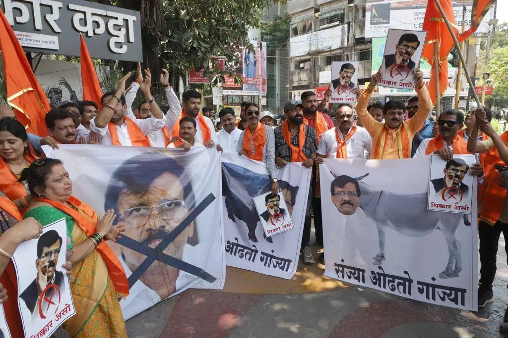Shivsena Workers Spits On Sanjay Raut Face Banner Morph Picture With Donkey Shinde Group Ladies Beats With Shoes Photos Viral