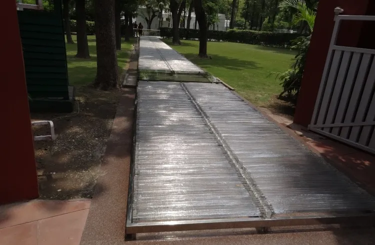 Now called 'The Path of Martyrdom', it shows the path Gandhi took that day. She was fired upon by two security personnel on reaching the gate and sentry post. It is now covered by a glass top,
