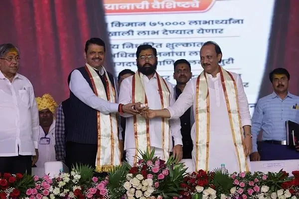 Chief Minister Eknath Shinde, Deputy chief minister Devendra Fadnavis along with Deputy chief minister Ajit Pawar sharing dais for 'Shasan Aplya Dari' progam of state government. (Express Photo by Pavan Khengre)