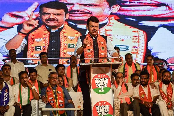 Fadnavis participates in a public meeting with BJP supporters in Mumbai North Central constituency at Sakinaka on 12 May 2024. (Express photo by Sankhadeep Banerjee)