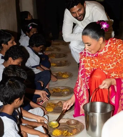 Kim Kardashian serving meals to poor kids